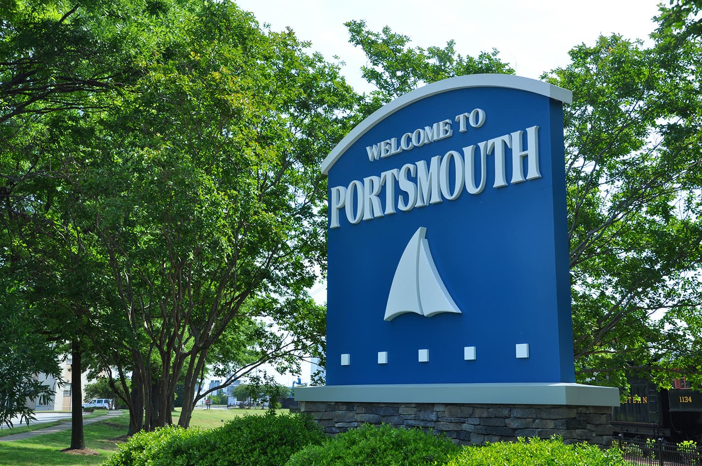 Welcome to Portsmouth Virginia city entrance sign with sailboat emblem